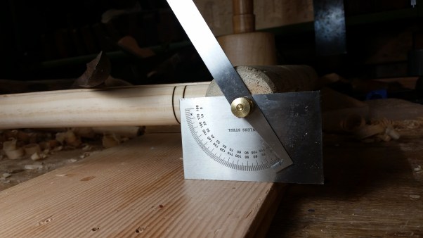 A protractor marking a 60 degree angle for drilling the mortise.