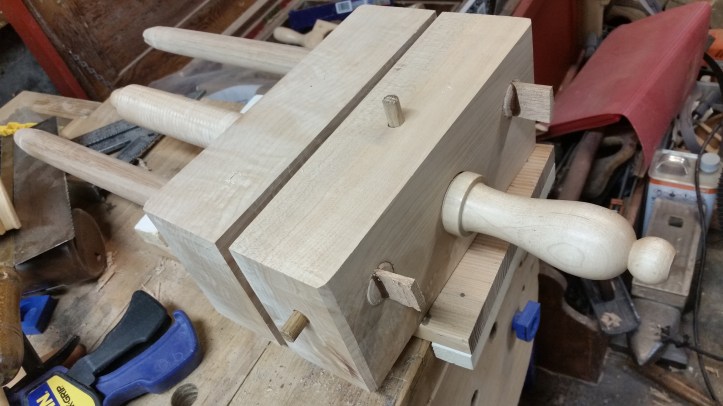 The almost completed bookbinder's plough. Oak pegs and wedges secure the rails and lock the handscrew in place.