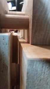 Extreme closeup of the book plough riding atop the press